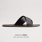 Nero | Flat leather sandal with debossed PLG three tree logo in sole, text reads "Sandals Roma 100% Veg Tan Leather"