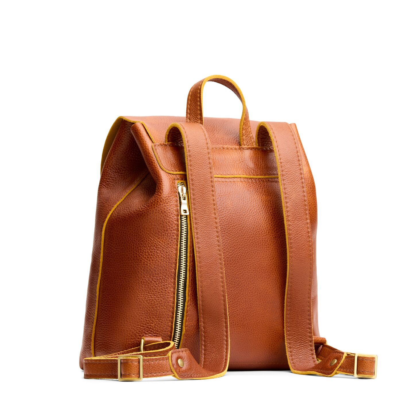 Sienna | Leather backpack with magnetic flap closure on a white background