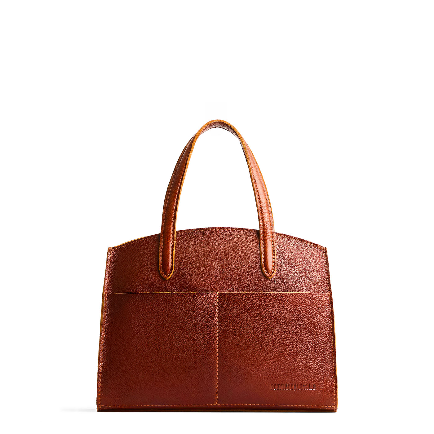 Nutmeg*Medium | Leather tote bag with handles, adjustable crossbody strap, zipper top, and two back pockets