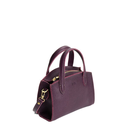 Plum*Mini | Leather tote bag with handles, adjustable crossbody strap, zipper top, and a back pocket