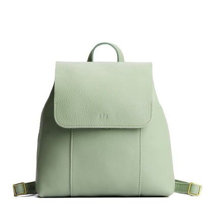Pistachio | Leather backpack with magnetic flap closure on a white