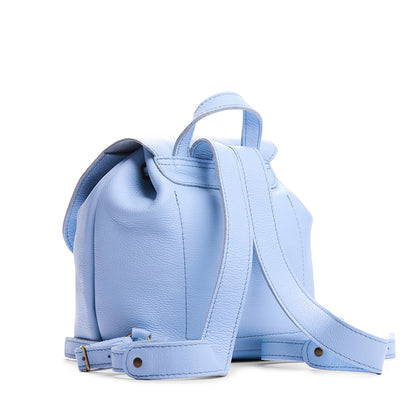 Skyway | Back of drawstring bucket backpack with snap closure under flap