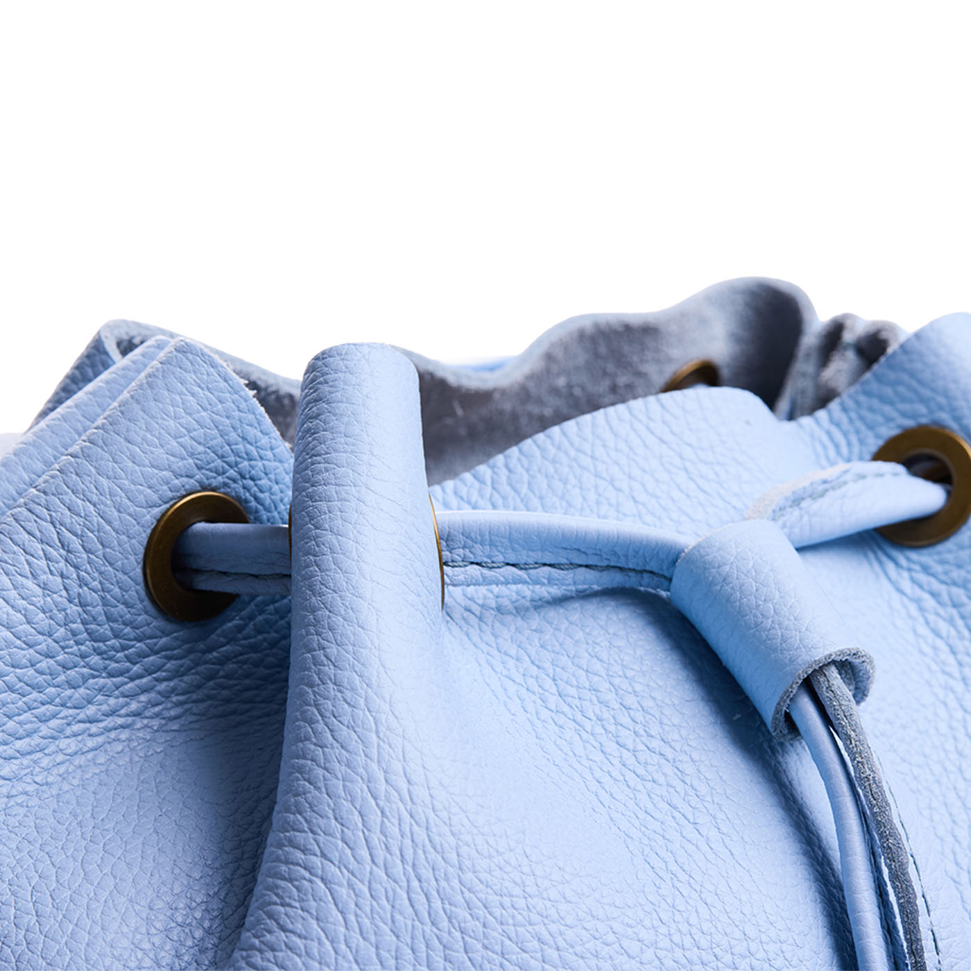 Skyway | Close up of a Drawstring bucket backpack with snap closure