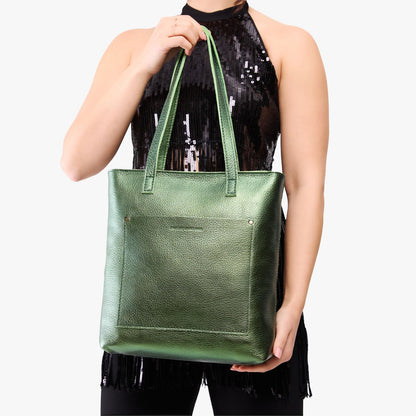 Metallic Greench*Zipper | Model holding medium Tote with dual shoulder straps and crossbody strap