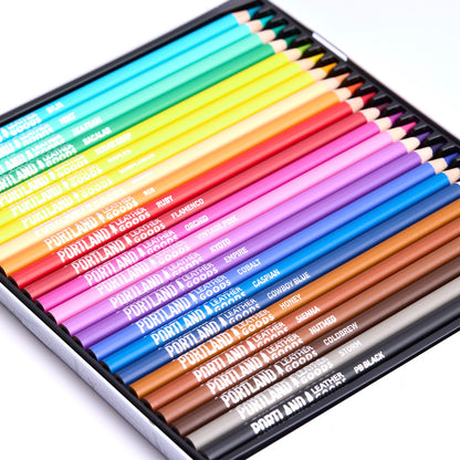 Set of colorful Portland Leather Goods branded colored pencils in a metal case.