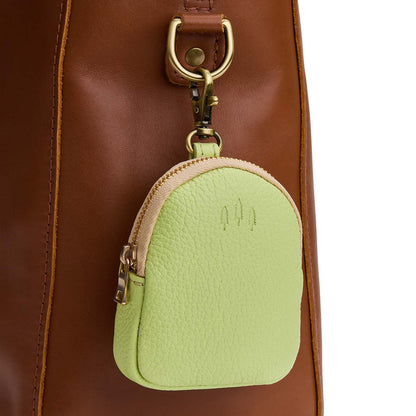 Shadow Lime | Leather keychain pouch with zipper top, swivel lobster clasp, and debossed emblem of three PLG trees