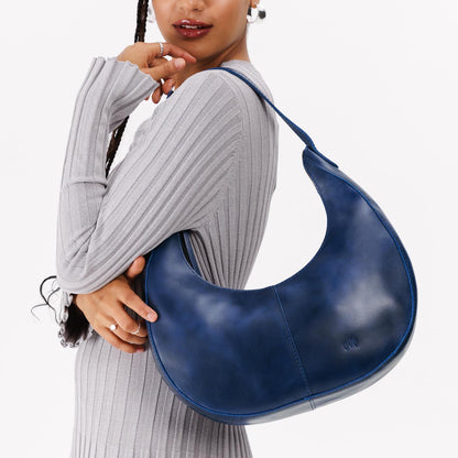 Cowboy Blue*Large | Crescent shaped shoulder bag with zipper closure and adjustable strap