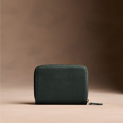 Regent Green | Wallet with card and storage pockets on a light brown background - back view