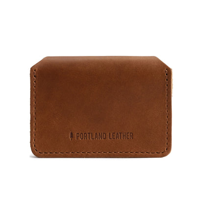 English Tan | Backside of small leather wallet with debossed PLG logo