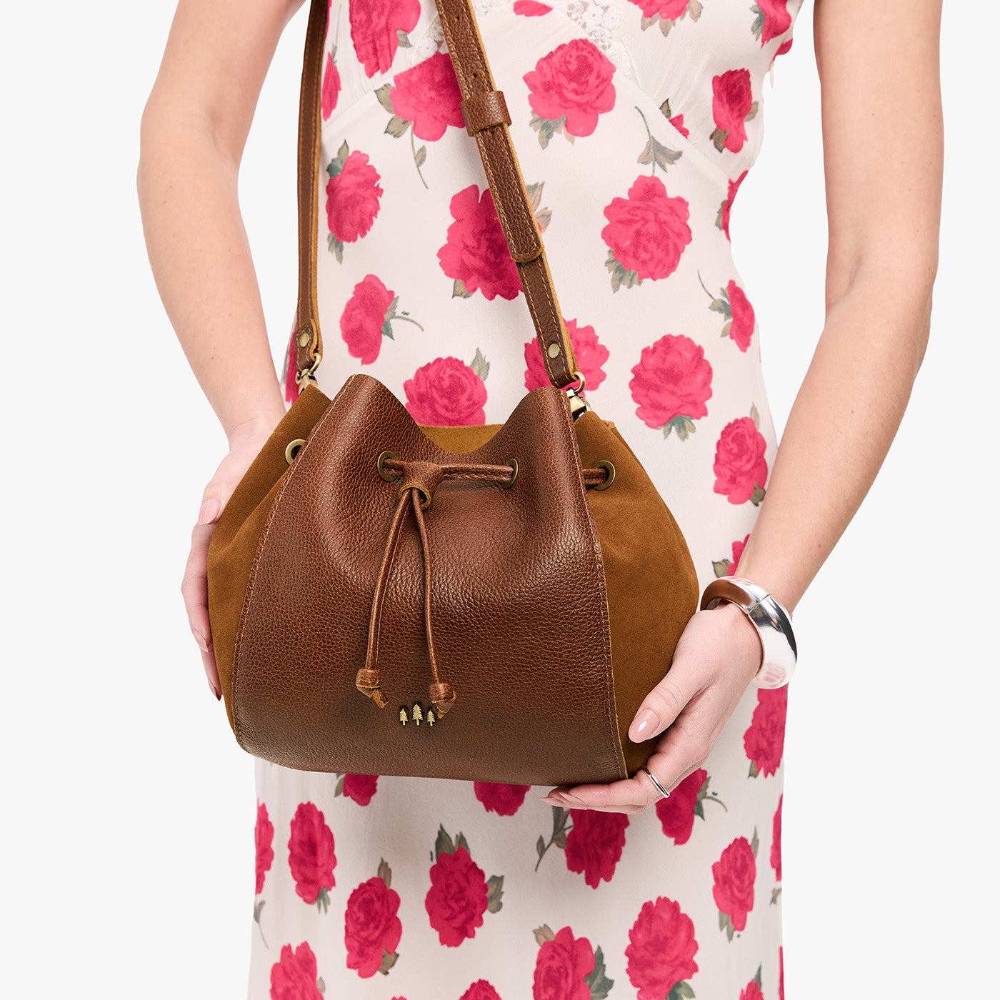 Asheville | Model wearing bucket bag with cinched drawstring closure