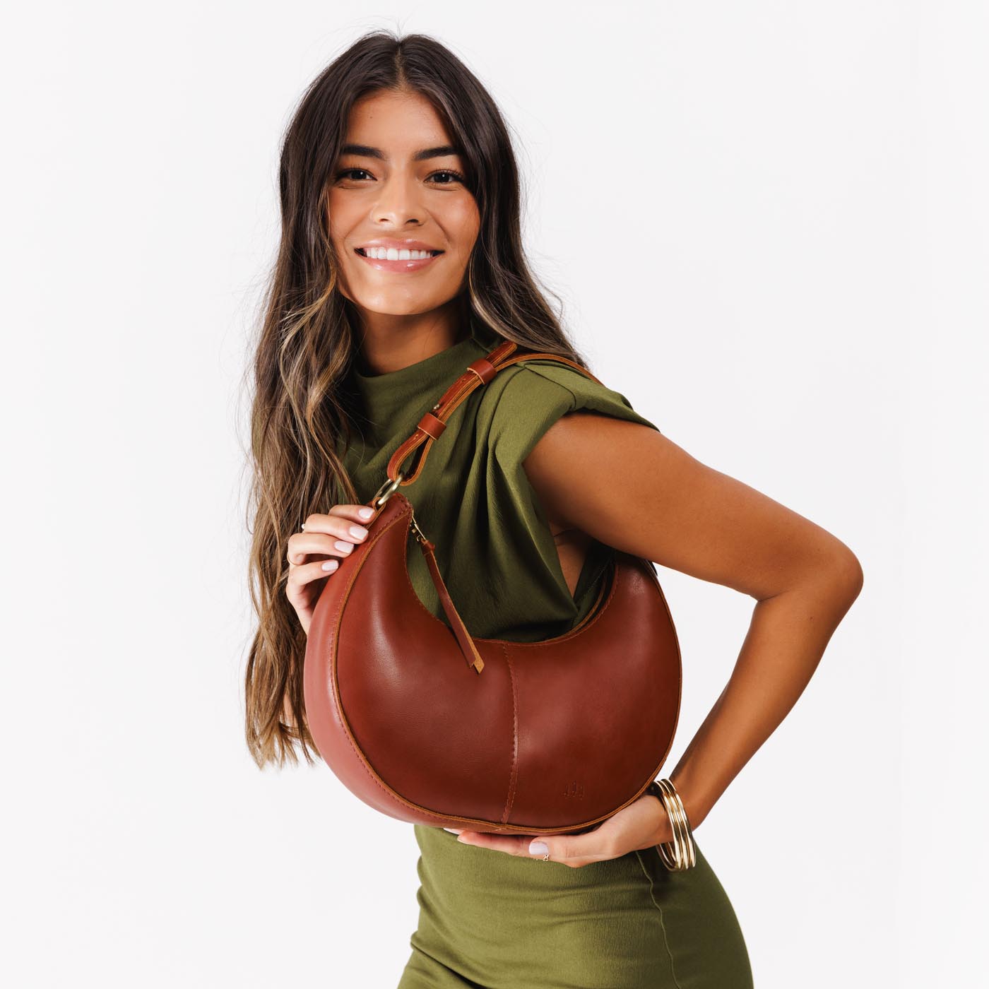 Chestnut*Small | Crescent shaped shoulder bag with zipper closure and adjustable strap