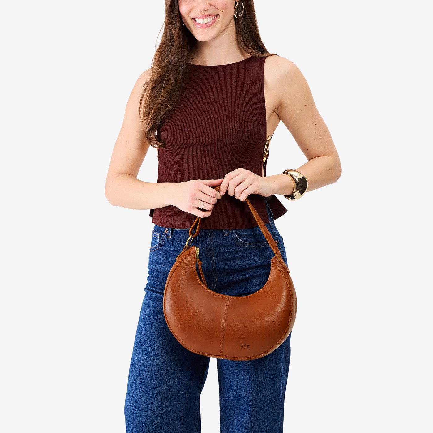 Honey*Small | Crescent shaped shoulder bag with zipper closure and adjustable strap