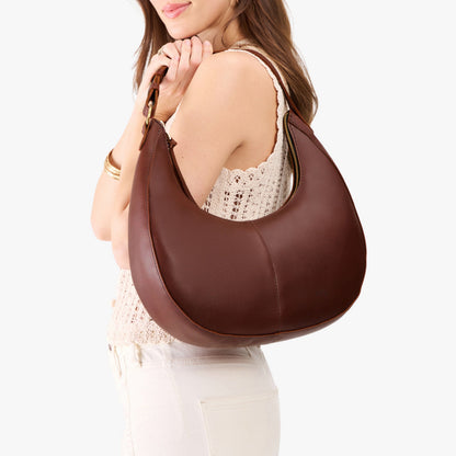 Cognac*Large | Crescent shaped shoulder bag with zipper closure and adjustable strap