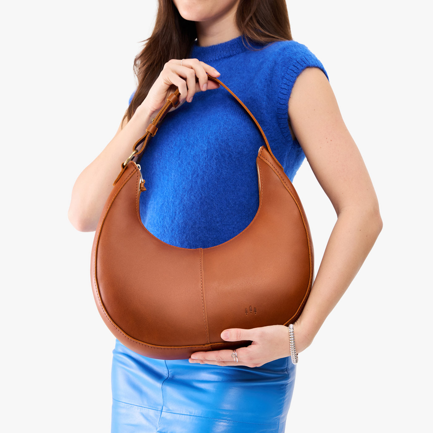 Honey*Large | Crescent shaped shoulder bag with zipper closure and adjustable strap