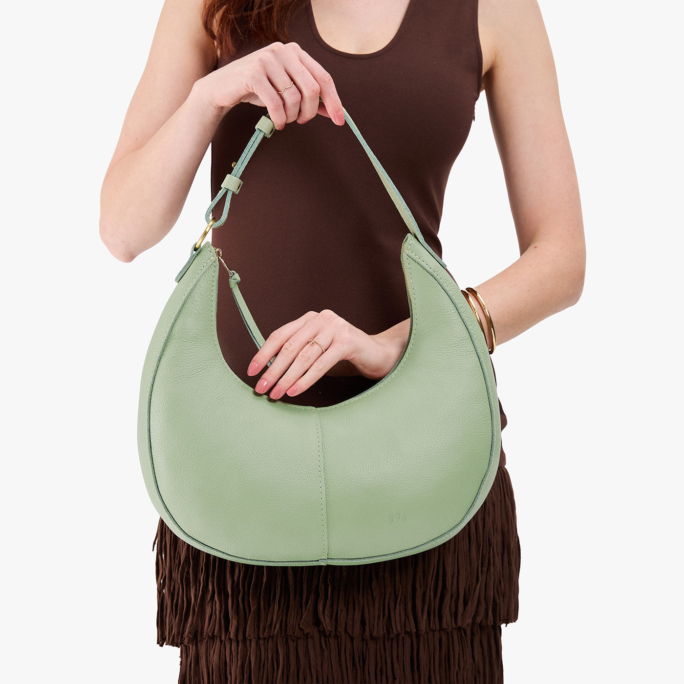 Pistachio*Large | Large crescent shaped shoulder bag with zipper closure and adjustable strap