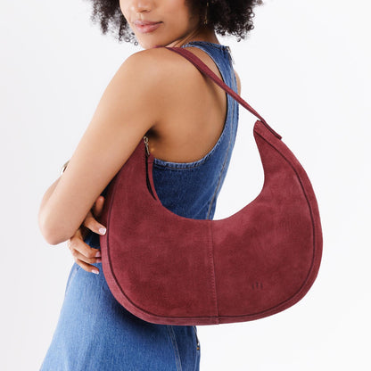 Red Panda*Large | Crescent shaped shoulder bag with zipper closure and adjustable strap