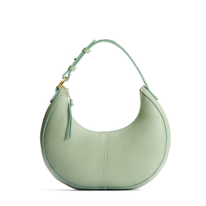 Pistachio*Small | Crescent shaped shoulder bag with zipper closure and adjustable strap
