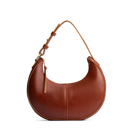 Chestnut*Small | Crescent shaped shoulder bag with zipper closure and adjustable strap