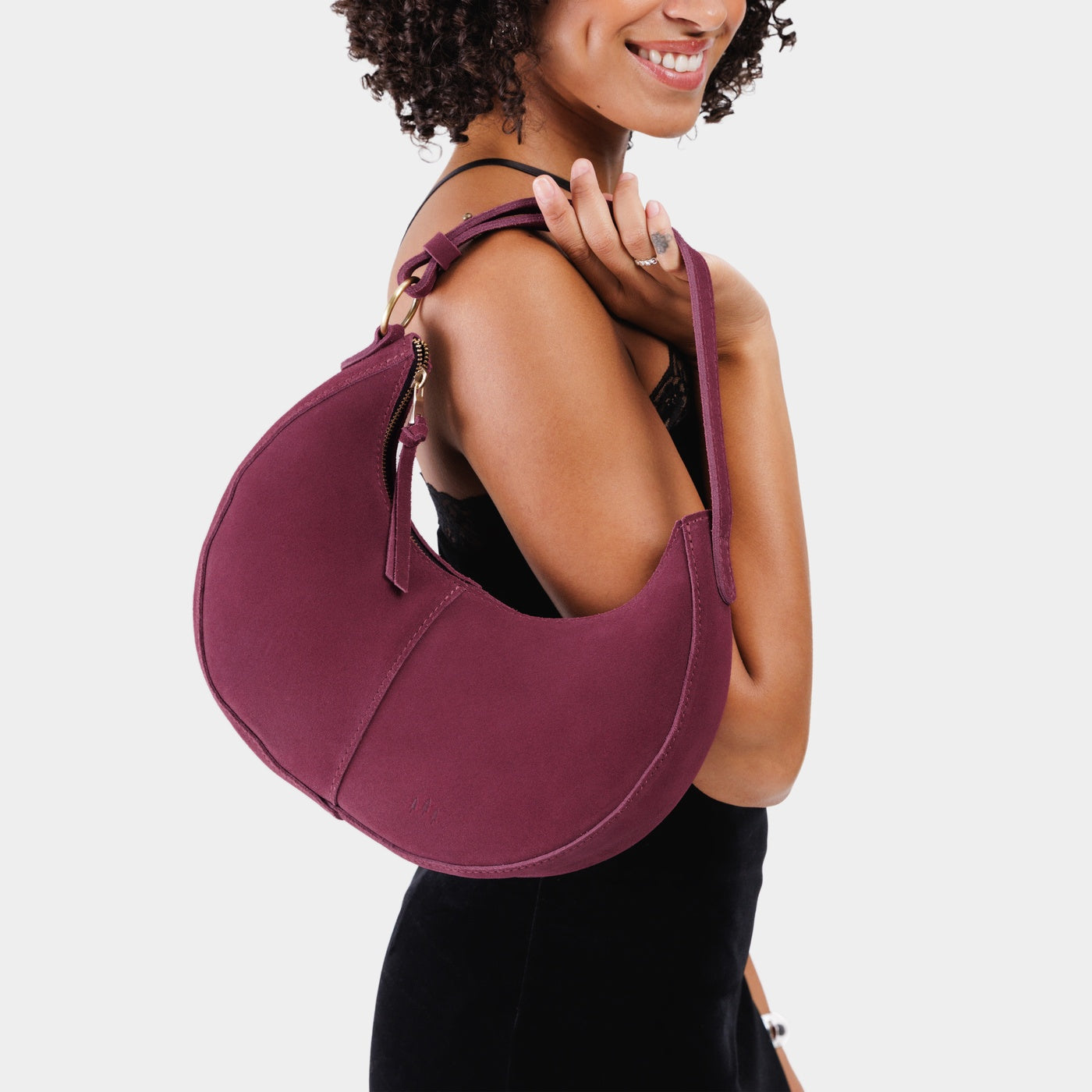 Superbloom*Small | Crescent shaped shoulder bag with zipper closure and adjustable strap