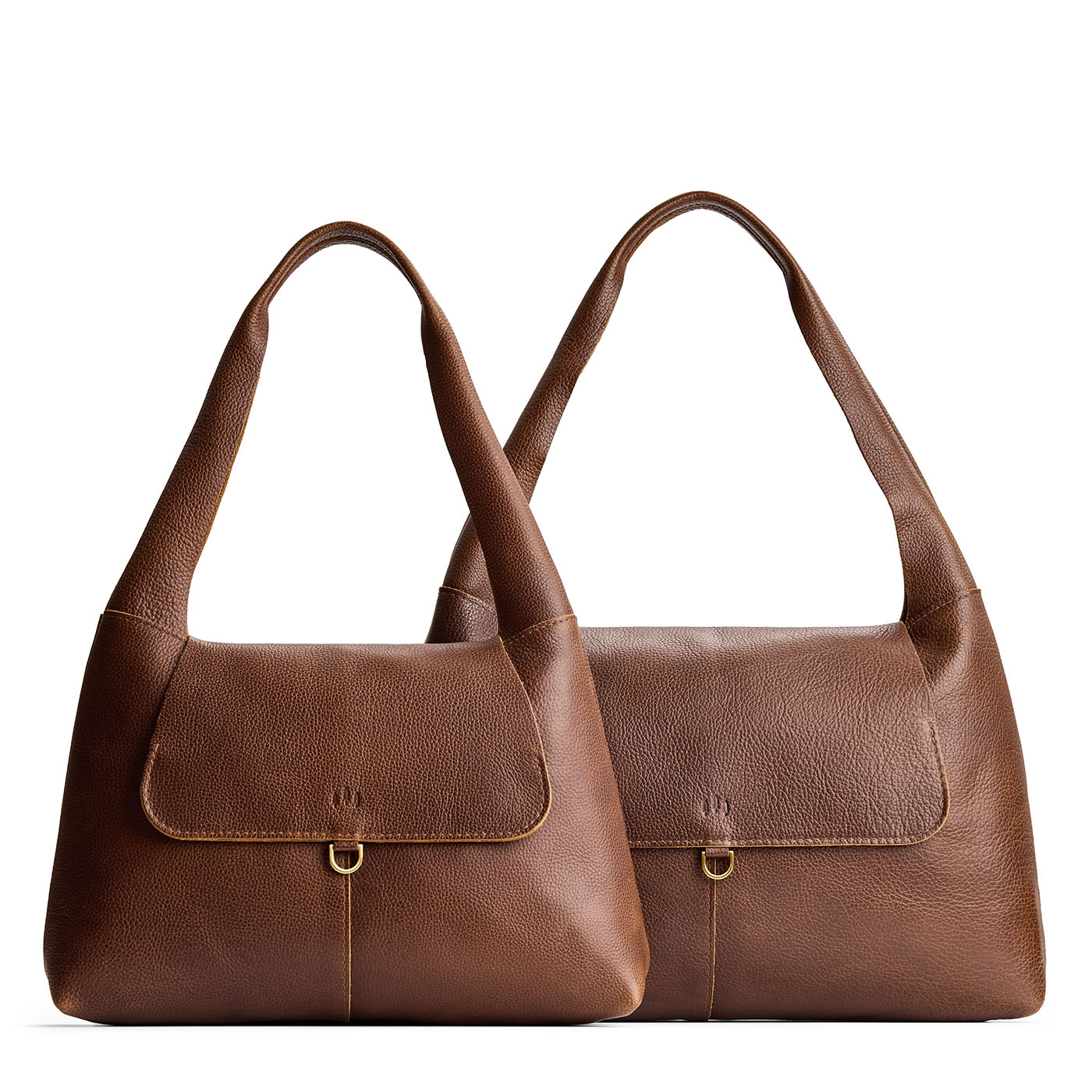 Asheville | Comparison image of a slouchy triangle shaped shoulder bag with a flap