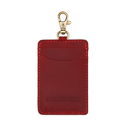 Phoenix | A leather card holder with a swivel lobster clasp on a white background