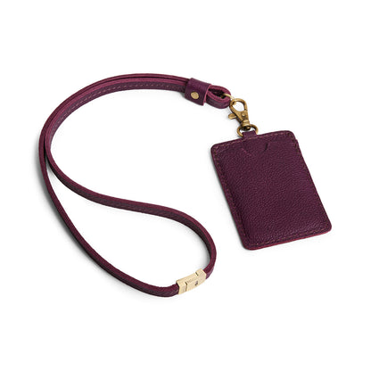 Plum | A leather lanyard attached to a matching card holder on a white background